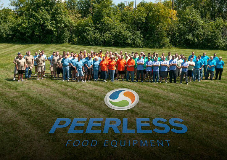 Peerless Food Equipment team standing in a group